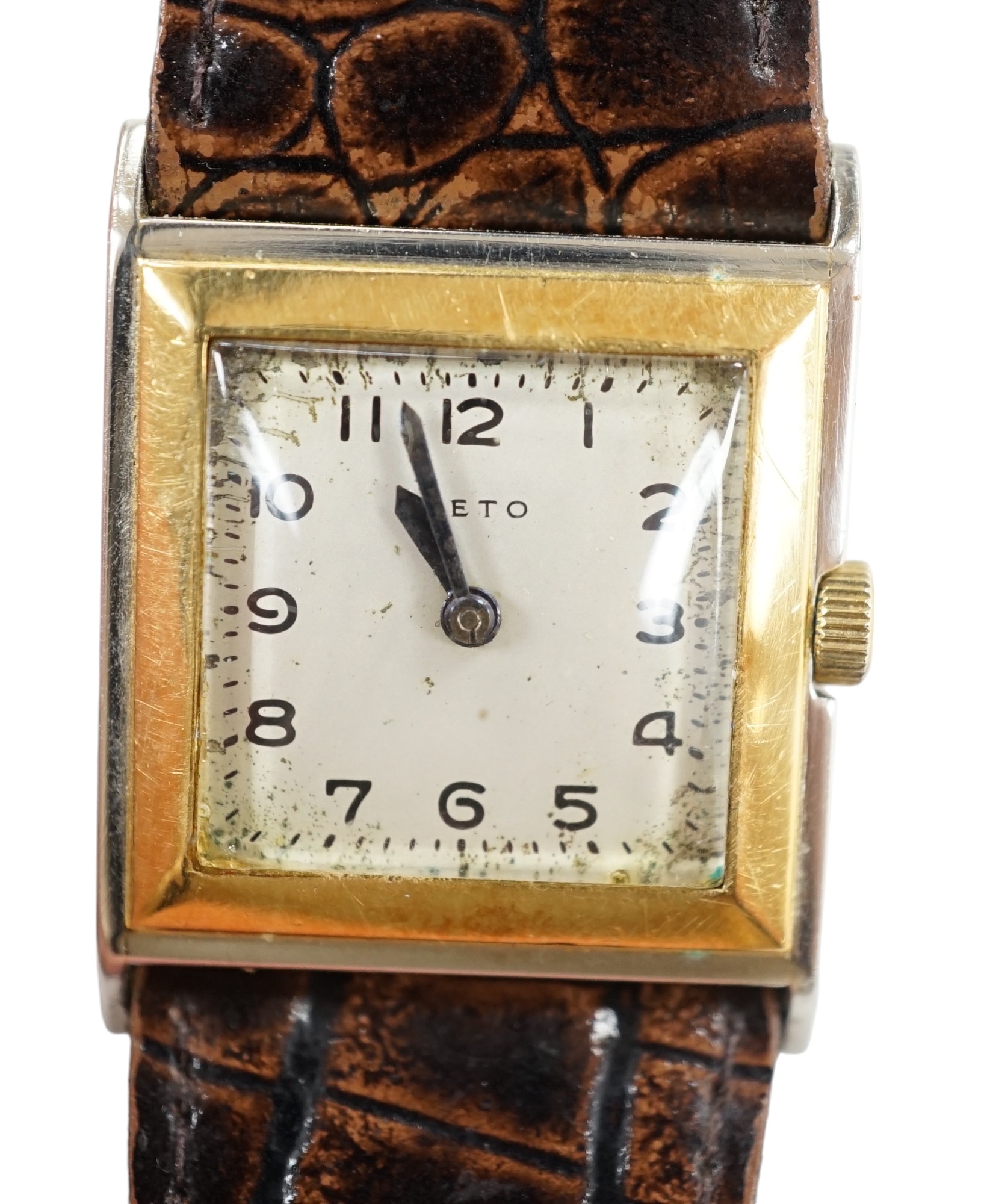 A gentleman's 18ct gold and steel Veto square case manual wind wrist watch, case diameter 26mm, on a leather strap. Condition - poor to fair